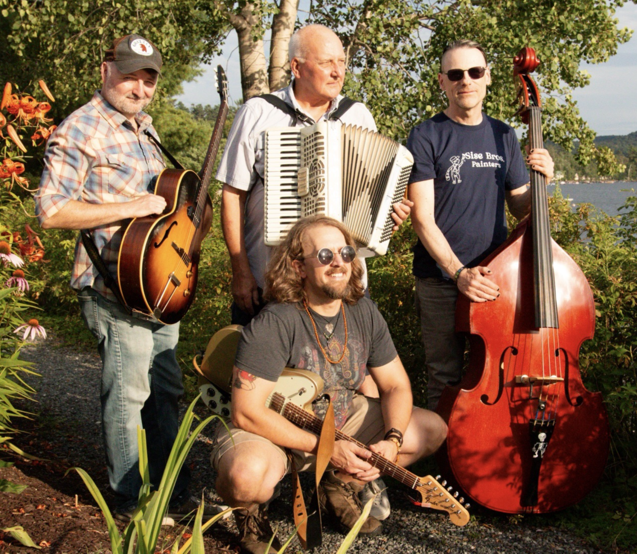 4 men in a band with instruments
